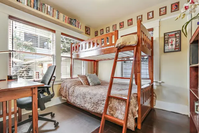Second bedroom with twin-over-full bunk bed and desk